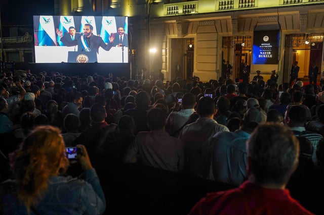 Supporters of Nayib Bukele watch a video feed as he delivers a State of the Union address at the National Palace in San Salvador, El Salvador, on June .