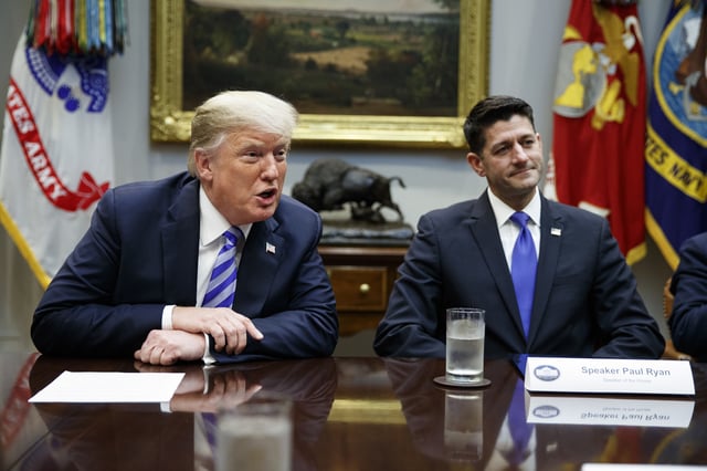 Speaker of the House Rep. Paul Ryan, R-Wis., listens to President Donald Trump speak during a meeting with Republican lawmakers in the Roosevelt Room of the White House in Washington on Sept. 5, 2018.