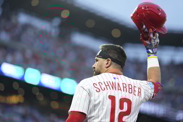 PHILADELPHIA, PENNSYLVANIA - JULY 19: Kyle Schwarber #12 of the Philadelphia Phillies salutes the crowd after hitting a grand slam in the bottom of the sixth inning against the Los Angeles Angels at Citizens Bank Park on July 19, 2025 in Philadelphia, Pennsylvania. (Photo by Mitchell Leff/Getty Images)