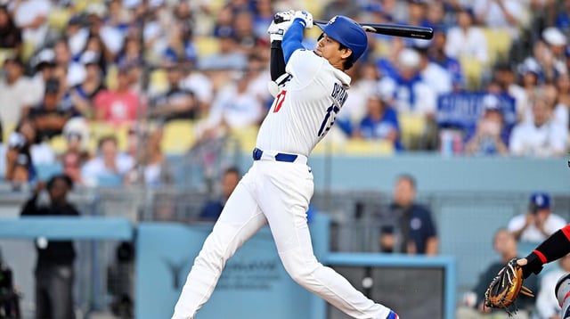 Aug 5, 2025; Los Angeles, California, USA; Los Angeles Dodgers two-way player Shohei Ohtani (17) hits a double during the first inning against the St. Louis Cardinals at Dodger Stadium. Mandatory Credit: William Liang-Imagn Images
