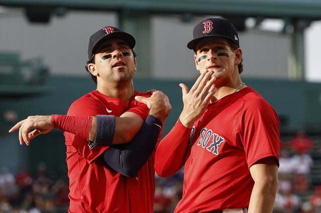 BOSTON, MA - JULY 2: Marcelo Mayer #39 of the Boston Red Sox, left, and Roman Anthony #19 talk before their game against the Cincinnati Reds at Fenway Park on July 2, 2025 in Boston, Massachusetts. (Photo By Winslow Townson/Getty Images)