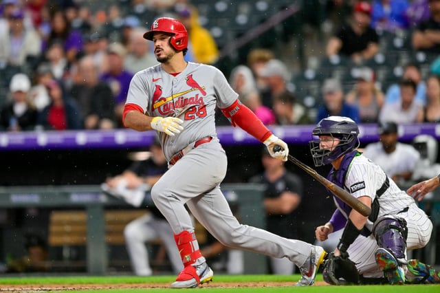 DENVER, COLORADO - JULY 22: Nolan Arenado #28 of the St. Louis Cardinals hits into a fourth inning run-scoring ground out against the Colorado Rockies at Coors Field on July 22, 2025 in Denver, Colorado.