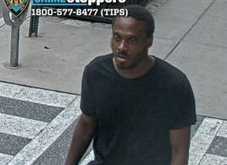 NYPD released photos of man who punched an elderly man in the face inside a Manhattan building on Tuesday. (NYPD)