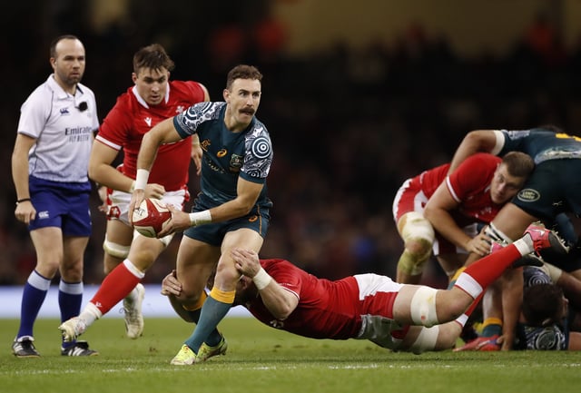 Rugby Union - Autumn International - Wales v Australia - Principality Stadium, Cardiff, Wales, Britain - November 20, 2021 Australia's Nic White in action with Wales' Aaron Wainwright Action Images via Reuters/Andrew Boyers/File Photo