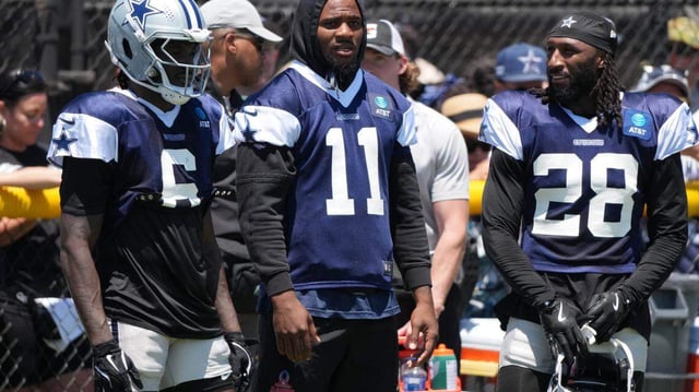 Has the presence of Dallas Cowboys defensive end Micah Parsons (11) at training camp been a distraction to the locker room?