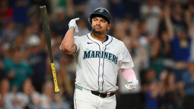 Aug 5, 2025; Seattle, Washington, USA; Seattle Mariners first baseman Josh Naylor (12) flips his bat after hitting a 2-run home run against the Chicago White Sox during the seventh inning at T-Mobile Park. Mandatory Credit: Steven Bisig-Imagn Images