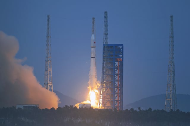 A Chinese Long March-12 carrier rocket carrying a group of internet satellites blasts off from the Hainan commercial spacecraft launch site on August 4, 2025, in Wenchang, Hainan Province of China.