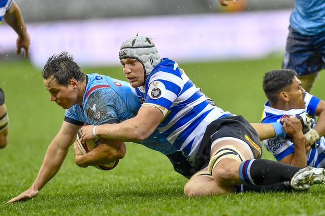 CAPE TOWN, SOUTH AFRICA - JULY 07: Chris Smith of Blue Bulls tackled by Louw Nel of WP during the Carling Currie Cup, Premier Division match between DHL Western Province and Vodacom Bulls at DHL Stadium on July 07, 2024 in Cape Town, South Africa. (Photo by Ashley Vlotman/Gallo Images)