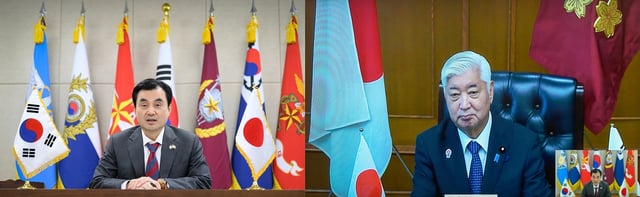 Defense Minister Ahn Gyu-back (L) and his Japanese counterpart, Gen Nakatani, hold a phone conversation via teleconference on Aug. 7, 2025, in this photo provided by Ahn's office. (PHOTO NOT FOR SALE) (Yonhap)