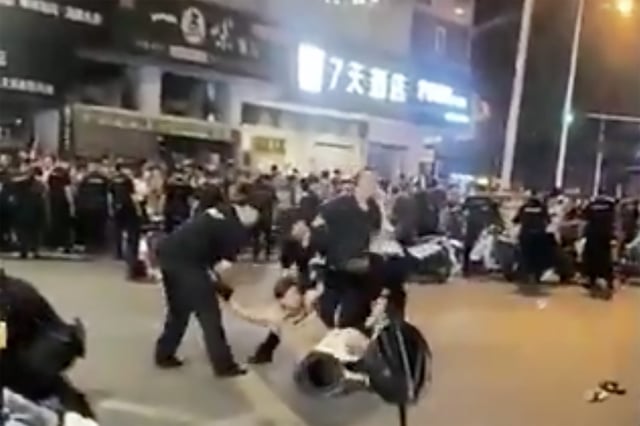 Videos show rare protests and police scuffle in Jiangyou, Sichuan, following a video of school violence circulate.
