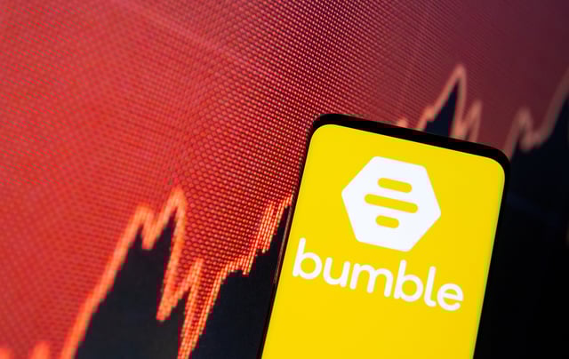 The Bumble logo is seen on a smartphone in front of a stock graph in this illustration taken February 11, 2021. REUTERS/Dado Ruvic/Illustration