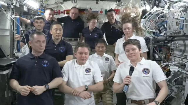 Anne McClain bids farewell during ISS ceremony on August 5
