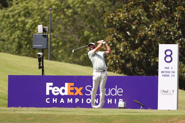 Scottie Scheffler of the United States plays his shot from the eighth tee during the final round of the FedEx St. Jude Championship at TPC Southwind on August 18, 2024 in Memphis, Tennessee.
