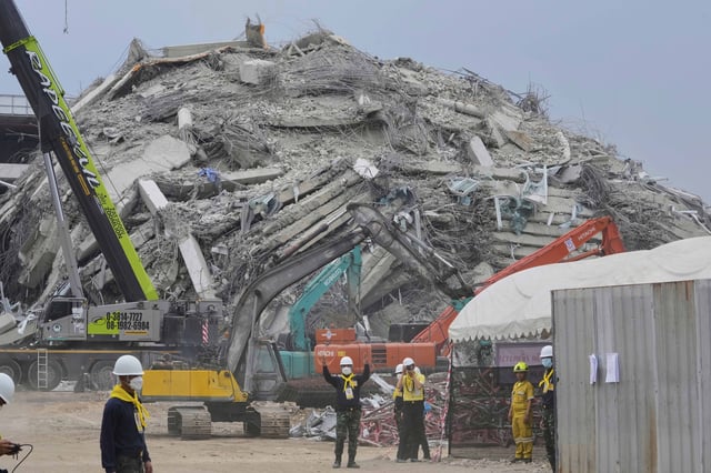 FILE - Rescuers work at the site of an under-construction high-rise building that collapsed after an earthquake in Bangkok, Thailand, Monday, March, 31, 2025. (AP Photo/Manish Swarup, File)