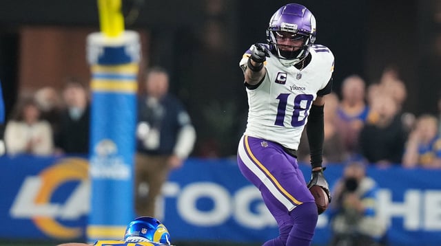 Minnesota Vikings receiver Justin Jefferson (18) signals a first down after a catch against the Los Angeles Rams during their playoff game at State Farm Stadium on Jan. 13, 2025, in Glendale. Joseph Rondone/The Republic / USA TODAY NETWORK via Imagn Images