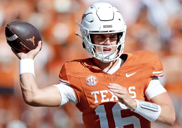Arch Manning #16 of the Texas Longhorns throws a pass in the second half against the Mississippi State Bulldogs at Darrell K Royal-Texas Memorial Stadium on September 28, 2024 in Austin, Texas.
