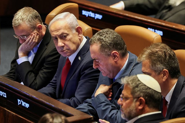 Israeli Prime Minister Benjamin Netanyahu attends a discussion at the plenum in the Knesset, Israel's parliament, in Jerusalem, July 23, 2025. REUTERS/Ronen Zvulun/File Photo