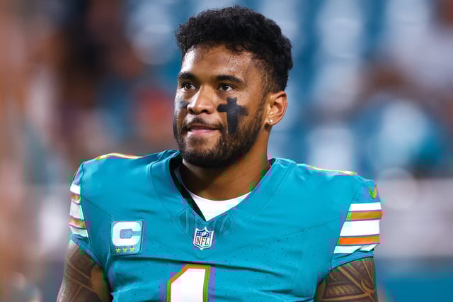 Tua Tagovailoa #1 of the Miami Dolphins looks on prior to playing a game against the Buffalo Bills at Hard Rock Stadium on September 12, 2024 in Miami Gardens, Florida.