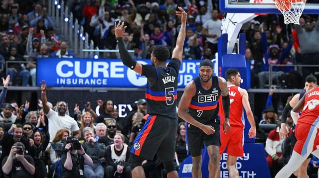Apr 5, 2025; Detroit, Michigan, USA; Detroit Pistons guard Malik Beasley (5) celebrates after making a three point basket against the Memphis Grizzlies in the fourth quarter at Little Caesars Arena. Mandatory Credit: Lon Horwedel-Imagn Images