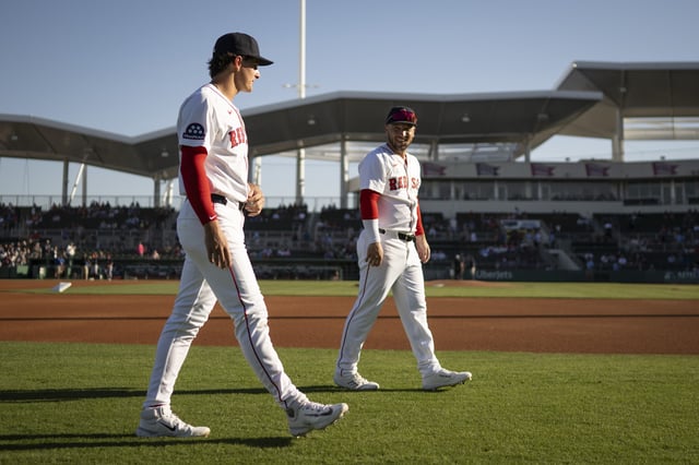 FORT MYERS, FLORIDA - March 12: Roman Anthony #48 of the Boston Red Sox reacts with Alex Bregman #2 of the Boston Red Sox as they warm up before a Grapefruit League game against the Minnesota Twins at JetBlue Park at Fenway South on March 12, 2025 in Fort Myers, Florida. (Photo by Maddie Malhotra/Boston Red Sox/Getty Images)