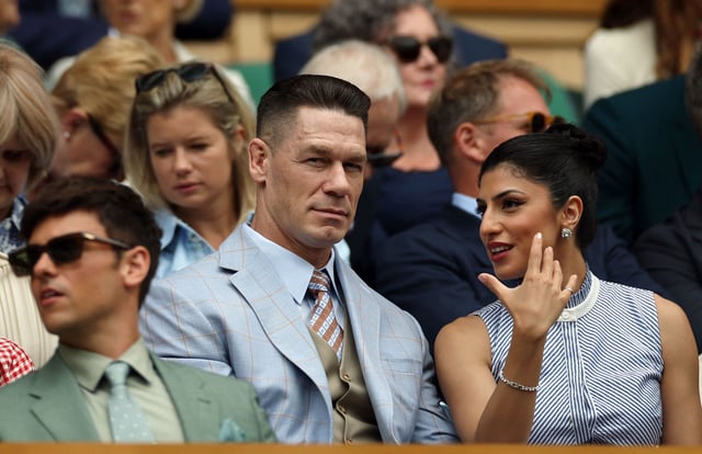 (From left) John Cena with his wife Shay Shariatzadeh in the Royal Box at Wimbledon in July.