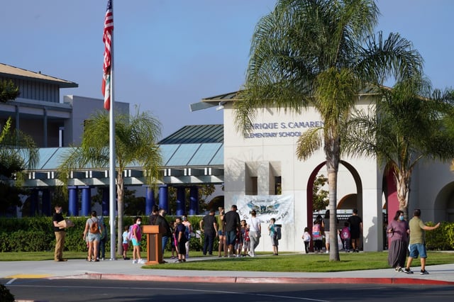 ..A Enrique S. Camarena Elementary School on Wednesday, July 21, 2021 in Chula Vista, CA., elementary school children arrive for the return back to school.  (Nelvin C. Cepeda / The San Diego Union-Tribune)