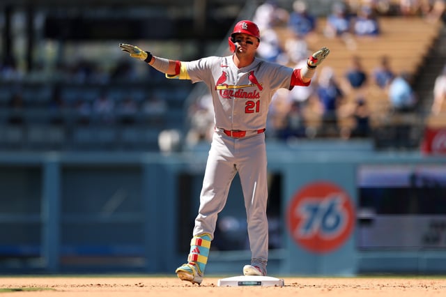 LOS ANGELES, CALIFORNIA - AUGUST 06: Lars Nootbaar #21 of the St. Louis Cardinals reacts after hitting an RBI double against the Los Angeles Dodgers during the ninth inning at Dodger Stadium on August 06, 2025 in Los Angeles, California.
