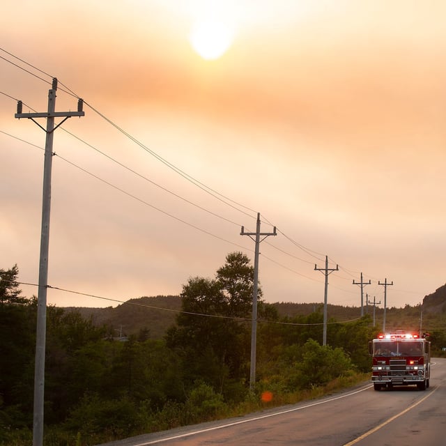 Forest fires have closed roads and caused mandatory evacuations from several Avalon Peninsula communities along Conception Bay North N.L., Tuesday, Aug. 5, 2025. THE CANADIAN PRESS/Paul Daly