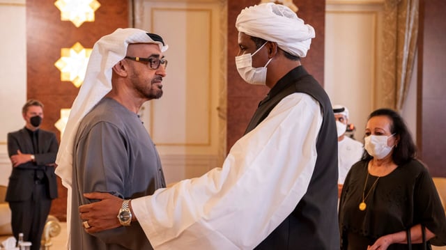 Mohammed Hamdan Dagalo offers condolences to UAE President Mohamed bin Zayed Al Nahyan at the funeral of Al Nahyan’s brother, Sheikh Khalifa bin Zayed Al Nahyan, in Abu Dhabi, UAE, May 15, 2022. (Ministry of Presidential Affairs photo by Abdulla Al Neyadi via AP Images).