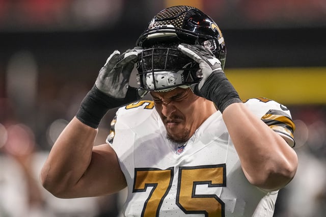 Nov 26, 2023; Atlanta, Georgia, USA; New Orleans Saints guard Andrus Peat (75) on the field prior to the game against the Atlanta Falcons at Mercedes-Benz Stadium. Mandatory Credit: Dale Zanine-USA TODAY Sports/File Photo
