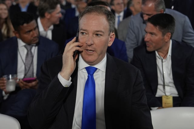 Environmental Protection Agency director Lee Zeldin arrives before President Donald Trump speaks during an AI summit at the Andrew W. Mellon Auditorium, Wednesday, July 23, 2025, in Washington. (AP Photo/Julia Demaree Nikhinson)