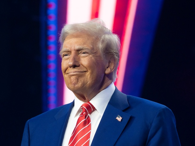 U.S. President-elect Donald Trump smiles during Turning Point USA's AmericaFest at the Phoenix Convention Center on December 22, 2024 in Phoenix, Arizona. The annual four day conference geared toward energizing and connecting conservative youth hosts some of the country's leading conservative politicians and activists. (Rebecca Noble/Getty)