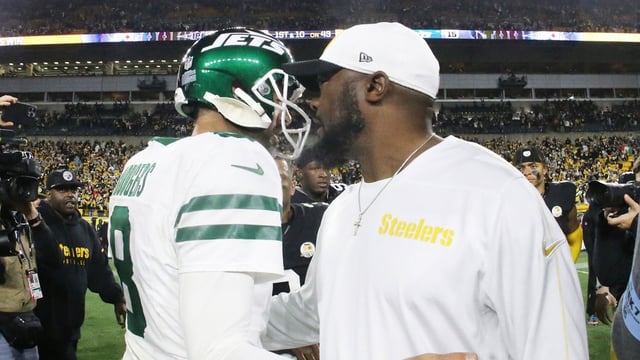 Oct 20, 2024; Pittsburgh, Pennsylvania, USA; New York Jets quarterback Aaron Rodgers (8) and Pittsburgh Steelers head coach Mike Tomlin (right) greet each other after their game at Acrisure Stadium. Mandatory Credit: Charles LeClaire-Imagn Images