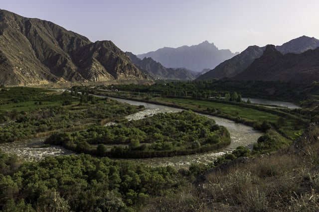 A view from Armenia&#39;s southern border reveals the Arax River, with Iran visible across the water on May 18, 2025.