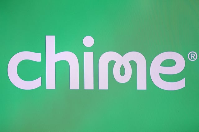 A screen displays the company logo for Chime, a financial technology company, during the company's IPO at the Nasdaq MarketSite in New York City, U.S., June 12, 2025. REUTERS/Kylie Cooper/File Photo