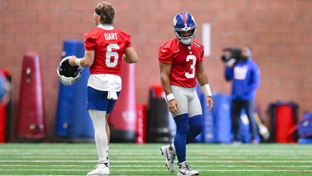Jun 17, 2025; East Rutherford, NJ, USA; New York Giants quarterback Jaxson Dart (6) and quarterback Russell Wilson (3) interact during minicamp at Quest Diagnostics Training Center.