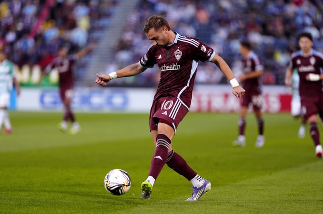 Jul 31, 2025; Commerce City, Colorado, USA; Colorado Rapids midfielder Djordje Mihailovic (10) kicks the ball at the net of Santos Laguna in the first half at Dick's Sporting Goods Park. Mandatory Credit: Ron Chenoy-Imagn Images/File Photo