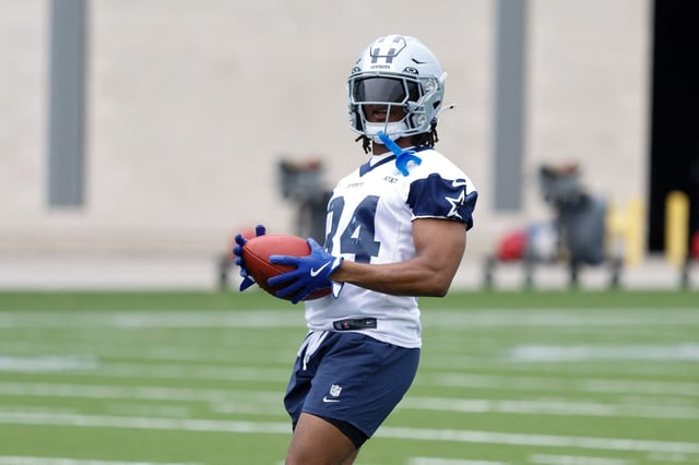 Jun 10, 2025; Arlington, TX, USA; Dallas Cowboys running back Jaydon Blue (34) goes through a drill during practice at the Ford Center at the Star Training Facility in Frisco, Texas. Mandatory Credit: Chris Jones-Imagn Images/File Photo