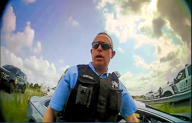 This still image from a deputy&#39;s body camera video provided by the Camden County Sheriff&#39;s Office shows Staff Sgt. Buck Aldridge following a chase and arrest on June 24, 2022. Aldridge was placed on administrative pending an investigation after he fatally shot Leonard Cure on Oct. 16, 2023, in Camden County, Georgia. The deputy shot the Black man at point-blank range during a traffic stop after the man, who had been wrongfully imprisoned years ago, grabbed the officer by the neck and was forcing his head backward, according to video released by a sheriff. (Camden County Sheriff&#39;s Office via AP)
