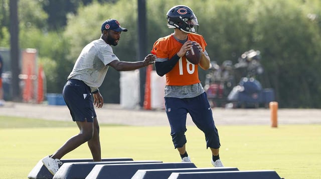 Jul 23, 2025; Lake Forest, IL, USA; Chicago Bears quarterback Caleb Williams (18) looks to pass the ball during training camp at Halas Hall. Mandatory Credit: Kamil Krzaczynski-Imagn Images