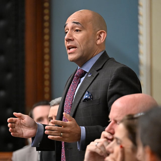 Quebec's legislature has unanimously adopted a motion in defence of Christmas. Christopher Skeete, the minister responsible for the fight against racism, introduced the motion which condemns the Canadian Human Rights Commission for describing Christmas as an "obvious example" of systemic religious discrimination linked to Canada's history of colonialism. Skeete responds to the Opposition during question period, Thursday, June 1, 2023, at the legislature in Quebec City. THE CANADIAN PRESS/Jacques Boissinot