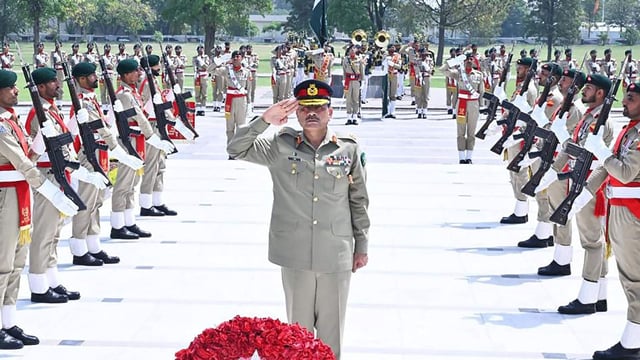 Field Marshal Asim Munir salutes after laying wreath on a martyrs' monument at the Pak army headquarters in Rawalpindi. 