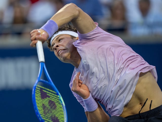 Ben Shelton of the USA serves to Karen Khachanov of Russia in the final at the National Bank Open in Toronto, Thursday, Aug. 7, 2025. THE CANADIAN PRESS/Frank Gunn