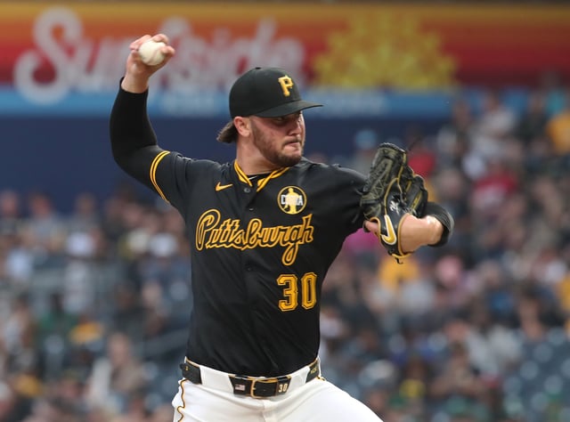 Aug 7, 2025; Pittsburgh, Pennsylvania, USA;  Pittsburgh Pirates starting pitcher Paul Skenes (30) pitches against the Cincinnati Reds during the fourth inning at PNC Park. Mandatory Credit: Charles LeClaire-Imagn Images
