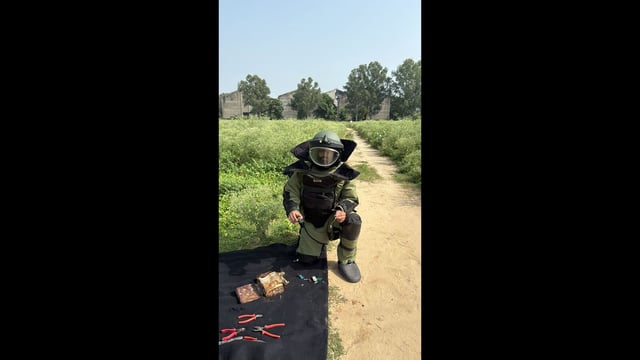 An Explosive Ordnance Disposal team defusing the IED recovered in Tarn Taran during a a search operation on Thursday. (HT)