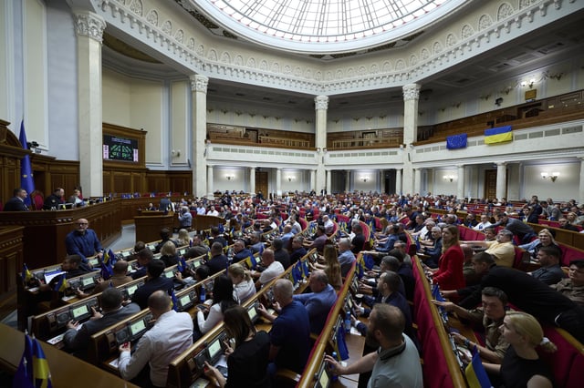 FILE - Ukrainian lawmakers vote for a new bill proposed by President Volodymyr Zelenskyy to restore the independence of the country's anti-corruption agencies at the parliament session hall in Kyiv, Ukraine, July 31, 2025. (AP Photo/Vadym Sarakhan, File)