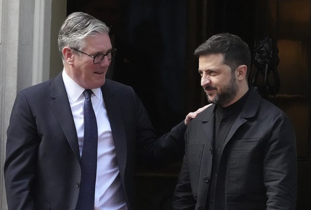 FILE - Britain's Prime Minister Keir Starmer and Ukraine's President Volodymyr Zelenskyy leave 10 Downing Street after a meeting in London on June 23, 2025. (AP Photo/Frank Augstein, File)