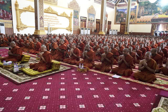Cambodian Buddhist monks chant in a Buddhist pagoda of Wat Botumvotey as they organize a ceremony to offer prayers to the remains of the soldiers who sacrificed their lives in battles with Thai troops along the disputed border areas, in Phnom Penh, Cambodia, Friday, Aug. 8, 2025. (AP Photo/Heng Sinith)