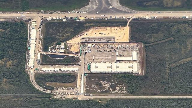 An ariel view of a migrant detention center, dubbed Alligator Alcatraz, is seen located at the site of the Dade-Collier Training and Transition Airport in Ochopee, Florida on July 7, 2025. 