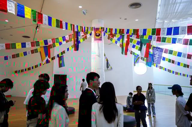 People attend the exhibition titled ‘Constellation of Complicity: Visualising the Global Machinery of Authoritarian Solidarity’, at the Bangkok Arts and Cultural Centre (BACC) in Bangkok, Thailand, August 7, 2025. REUTERS/Athit Perawongmetha